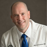 Mark E. Freeman, MD