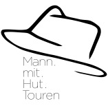 Mann mit Hut Touren